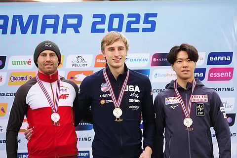 Jordan Stolz poses for the cameras