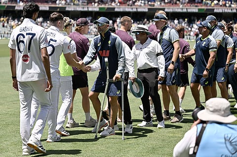 England and Australia players shake hands after Australia win the Ashes