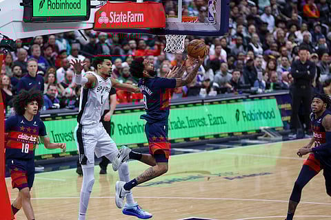 San Antonio Spurs and Washington Wizards in action