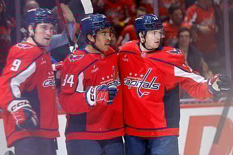 Justin Sourdif celebrates with his teammates