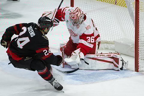 John Gibson makes a save against Ottawa Senators