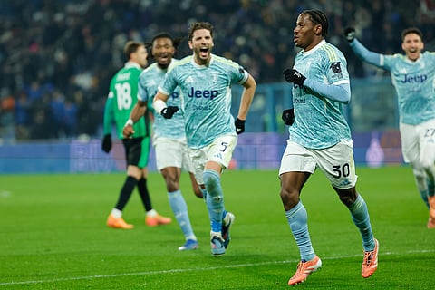 Jonathan David celebrates after scoring against Sassuolo