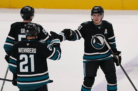 San Jose Sharks players celebrate their goal against Columbus Blue Jackets