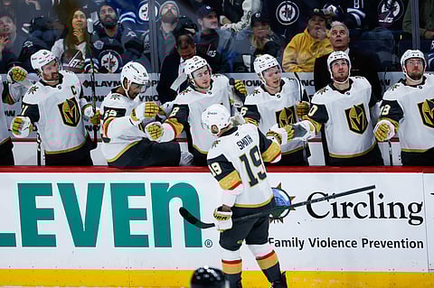 Vegas Golden Knights players celebrate their goal against Winnipeg Jets