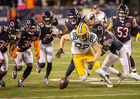 Luke Musgrave of Green Bay Packers chases the ball against Chicago Bears 