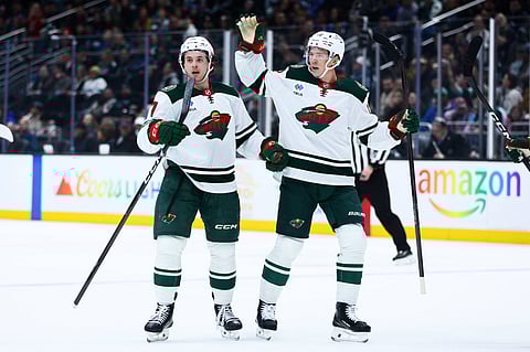 Minnesota Wild players celebrate goal against Seattle Kraken