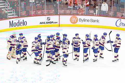Edmonton Oilers' players celebrate after beating Chicago Blackhawks