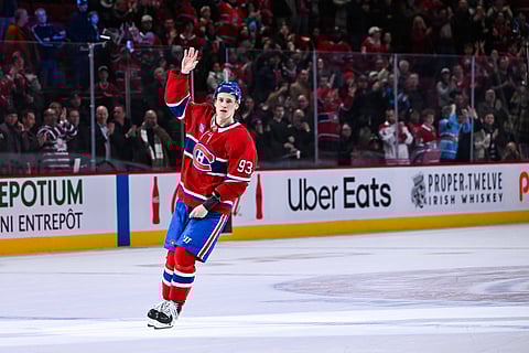 Montreal Canadiens right wing Ivan Demidov waves at the crowd
