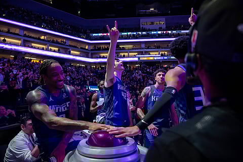 Sacramento Kings players light the beam after win over Los Angeles Lakers