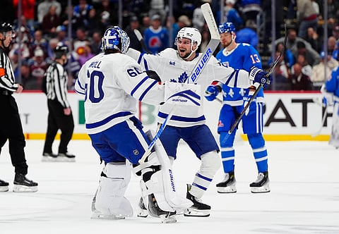 Toronto Maple Leafs players celebrate win vs Colorado Avalanche