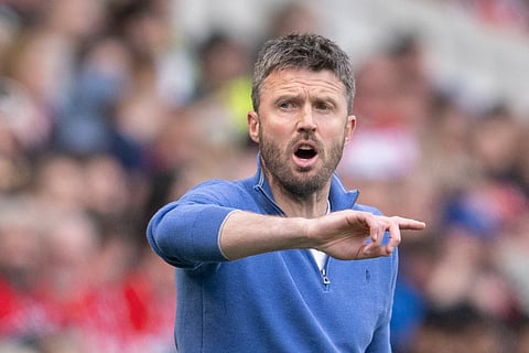 Michael Carrick gesturing during a match with Middlesbrough