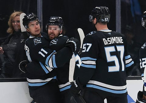 Utah Mammoth players celebration scoring a goal