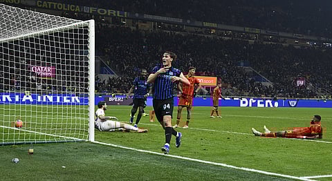 Francesco Pio Esposito celebrates after scoring the winning goal