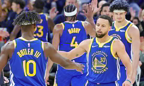 Golden State Warriors players during an NBA game