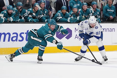 Tampa Bay Lightning and San Jose Sharks players in action