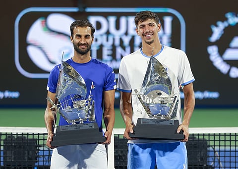 Yuki Bhambri poses with the 2025 Dubai Duty Free Championship