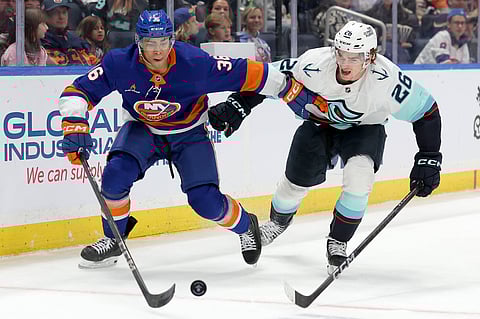 New York Islanders and Seattle Kraken players in action