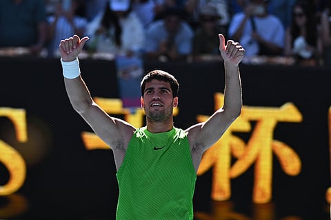 Carlos Alcaraz celebrates his win in the Australian Open second round
