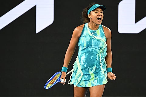 Naomi Osaka celebrates a point against Sorana Cirstea