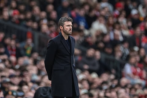Michael Carrick looks on during the Manchester Derby