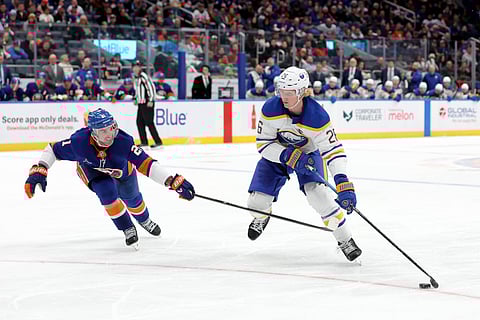 Buffalo Sabres and New York Islanders players in action