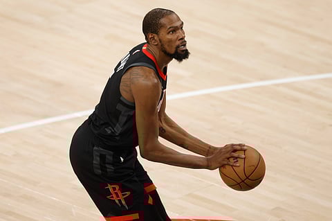 Houston Rockets' Kevin Durant with the ball 