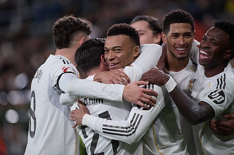 Kylian Mbappe celebrates his goal with teammates