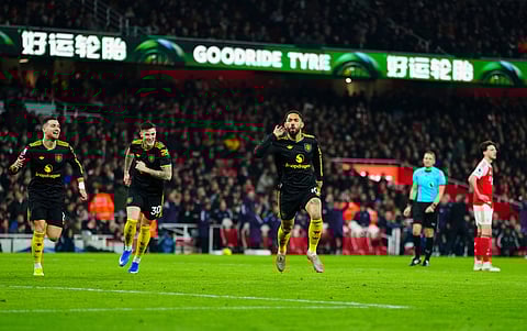 Matheus Cunha celebrates after netting the winning goal against Arsenal