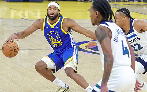 Golden State Warriors and Minnesota Timberwolves players in action