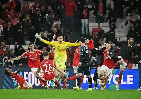Goalkeeper Anatoliy Trubin celebrates his last-minute goal against Real Madrid
