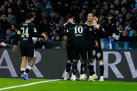 Joao Pedro celebrates with teammates after scoring against Napoli