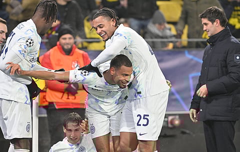 Andy Diouf of Inter Milan celebrates his goal against Borussia Dortmund
