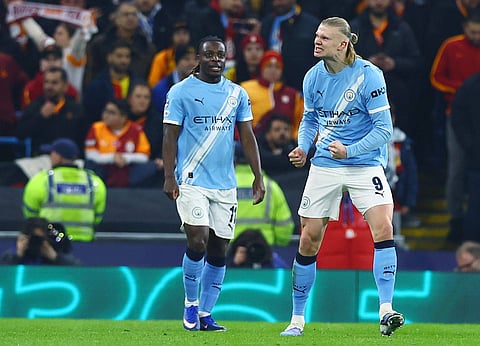 Erling Haaland celebrates after scoring the opening goal for Manchester City 