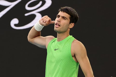 Carlos Alcaraz celebrates after reaching his maiden Australian Open final