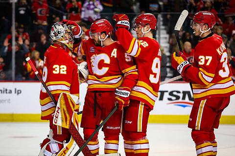 Calgary Flames players celebrate their win over San Jose Sharks