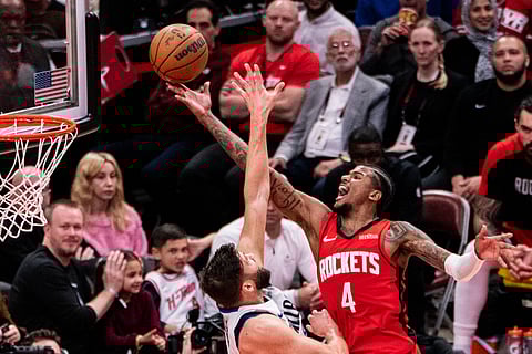 Houston Rockets and Dallas Mavericks players in action