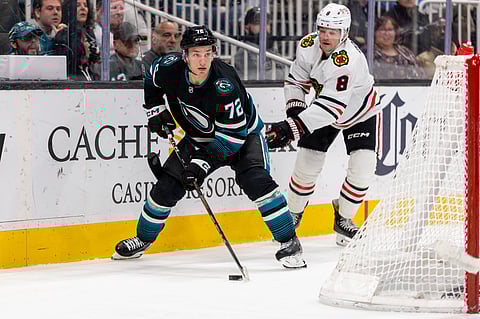 San Jose Sharks and Chicago Blackhawks players in action