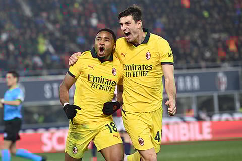 Christopher Nkunku celebrates his goal with Matteo Gabbia