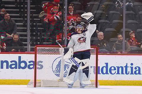 Elvis Merzlikins celebrates his shutout win