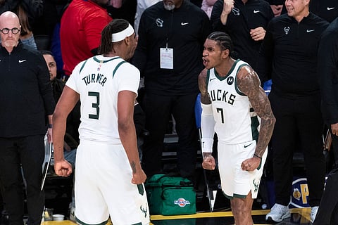 Kevin Porter Jr. and Myles Turner of Milwaukee Bucks during an NBA game