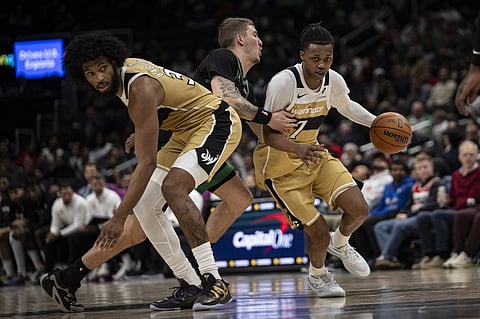 Bub Carrington of Washington Wizards carries the ball forward