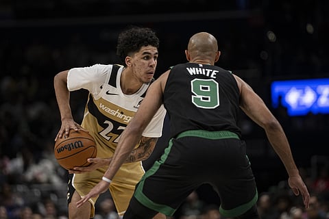 Will Riley of Washington Wizards with the ball