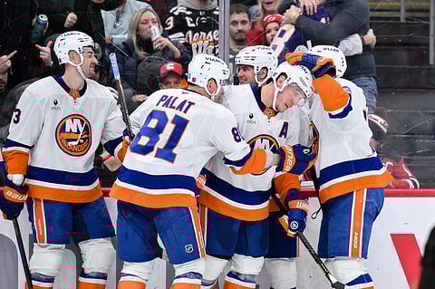 Bo Horvat celebrates with teammates