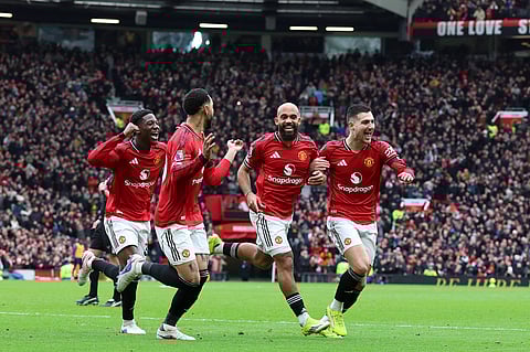 Bryan Mbeumo celebrates with teammates after putting Manchester United ahead