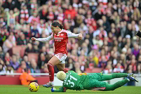 Olivia Smith on her way to score the first goal for Arsenal Women