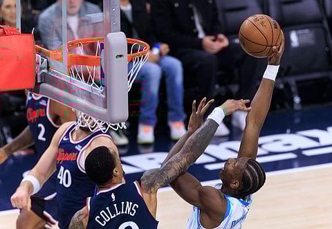 Moussa Diabate of Charlotte Hornets attempts a dunk