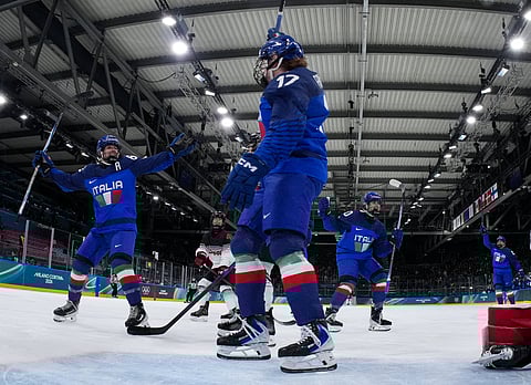 Italy players celebrate win over Japan