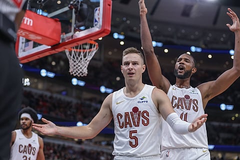 Sam Merrill reacts to a play