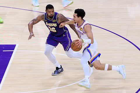 Jared McCain of Oklahoma City Thunder carries the ball 