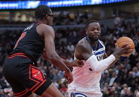 Julius Randle of Minnesota Timberwolves with the ball